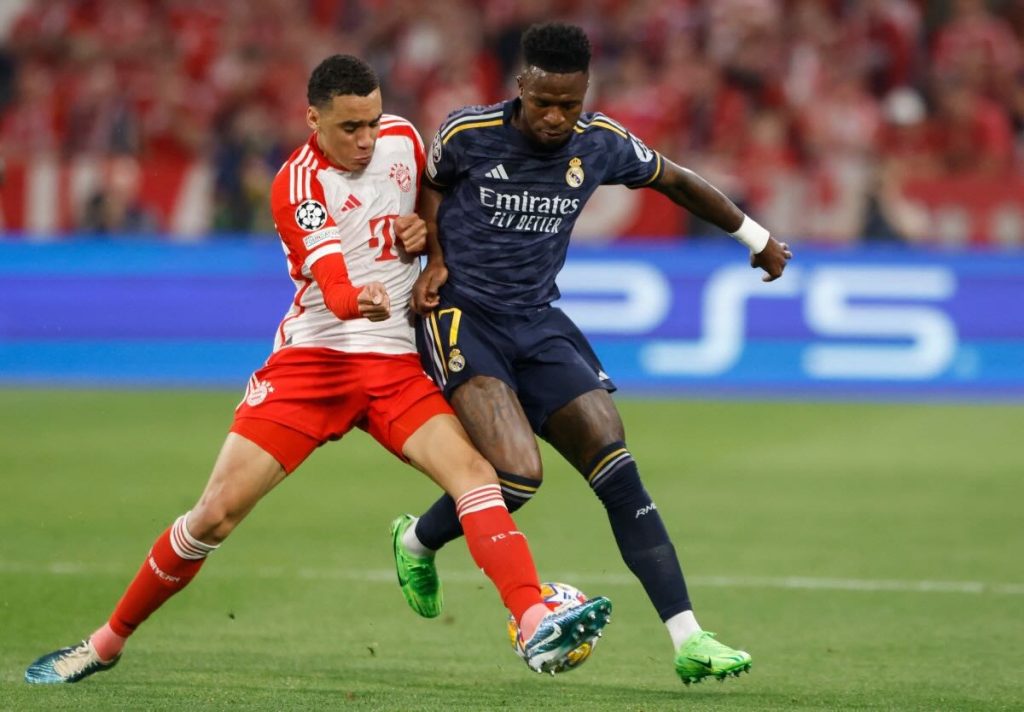 Vinicius hits brace as Real Madrid come back to snatch draw at Bayern - Vimarsana News