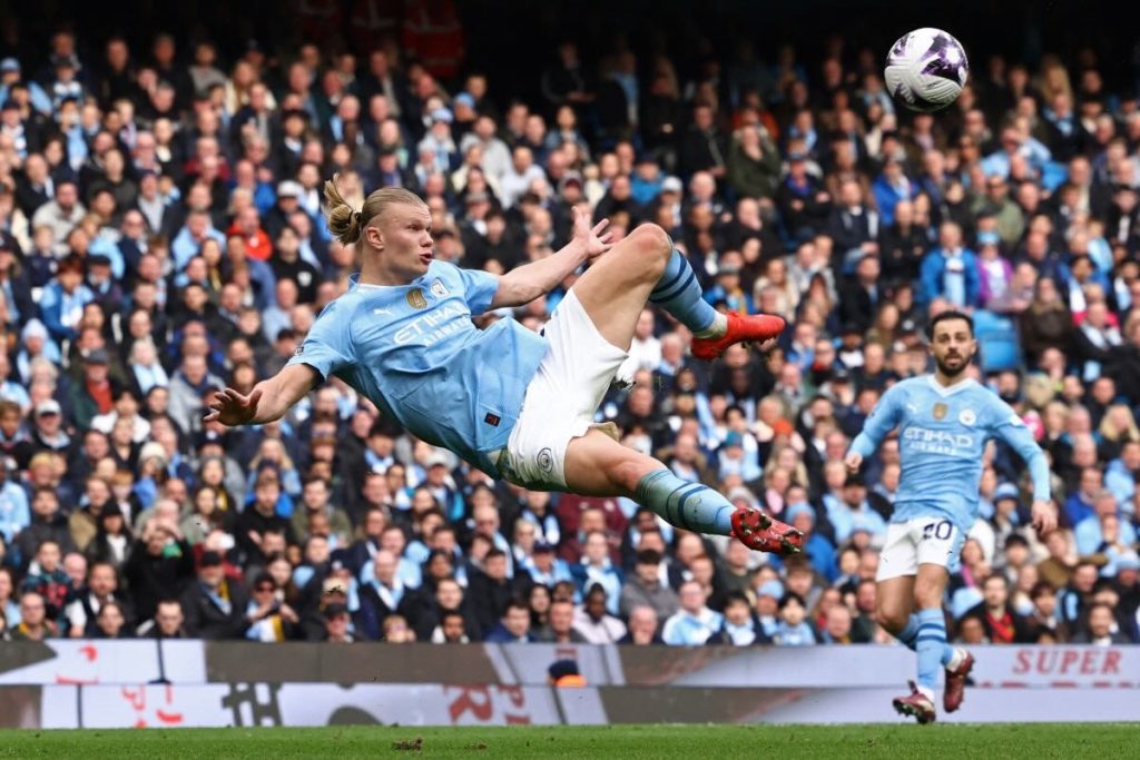 Haaland hits four as Man City keep title pressure on leaders Arsenal - Vimarsana News