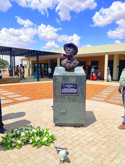 RESILIENCE … A commemorative bust stands tall against the backdrop of a modern building and the vibrant Namibian sky, symbolising resilience and honouring Hosea Kutako, a significant figure in the country’s history.