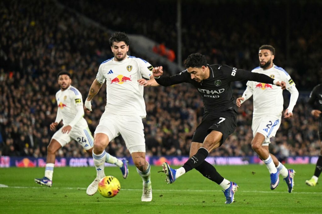 Man City win to close on Arsenal as Liverpool hit five