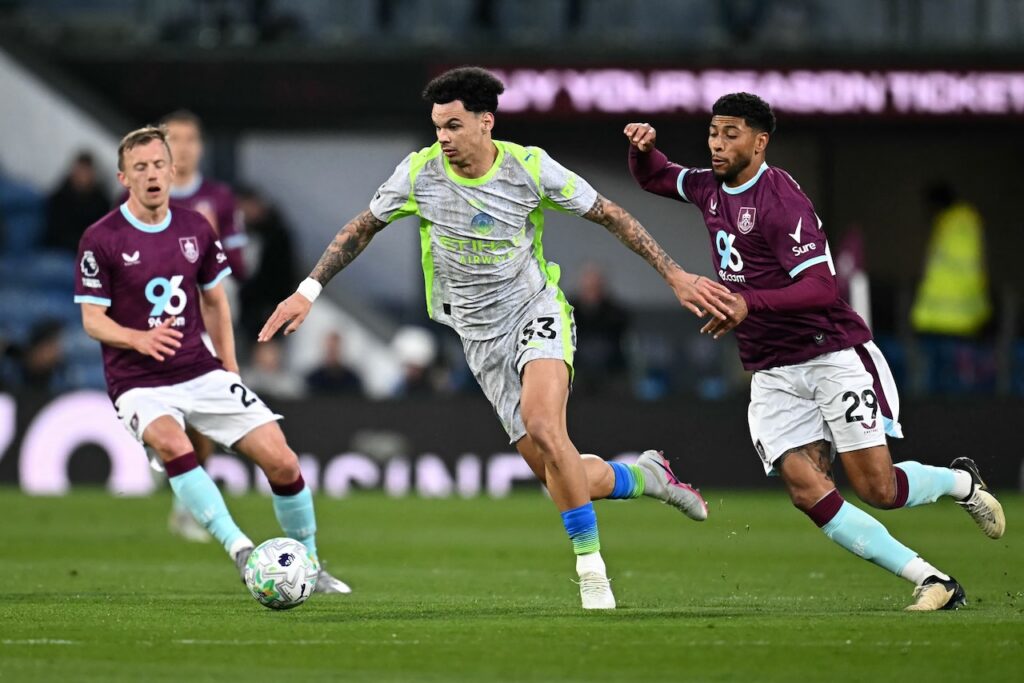 Manchester City go top of Premier League as Burnley relegated