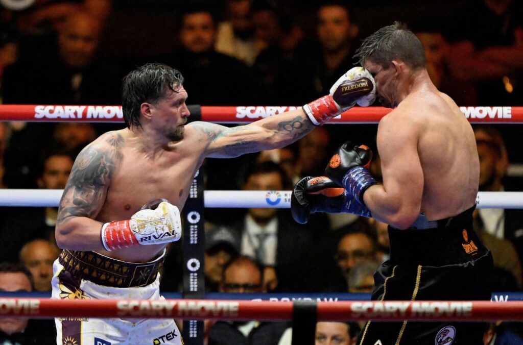 Usyk rocked before stopping Verhoeven to retain heavyweight belts