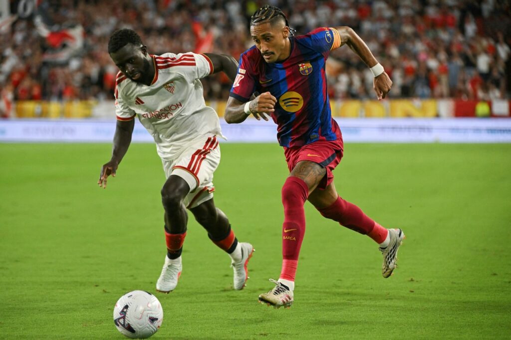 Raphinha treble fires perfect Barca to win at Seville