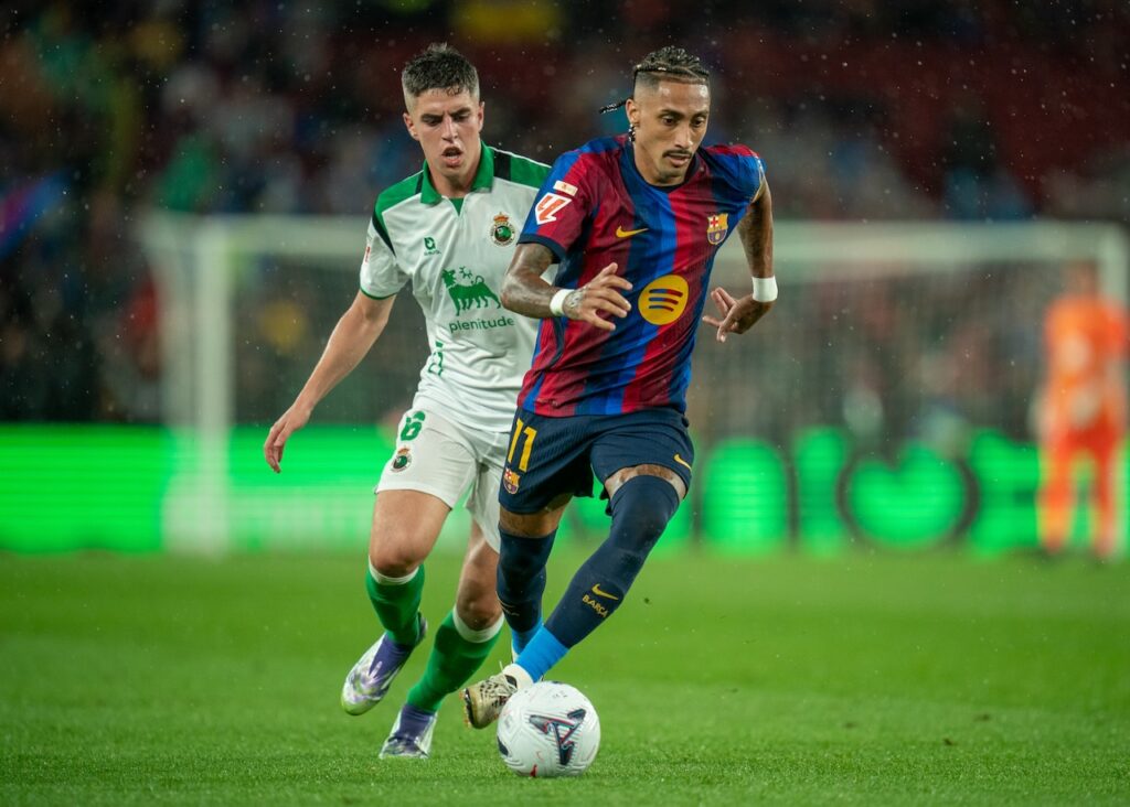 Barca hit Racing for seven as Atletico crush Osasuna