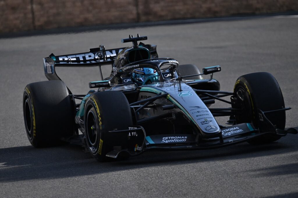 Russell holds off Verstappen to claim imperious victory in Baku